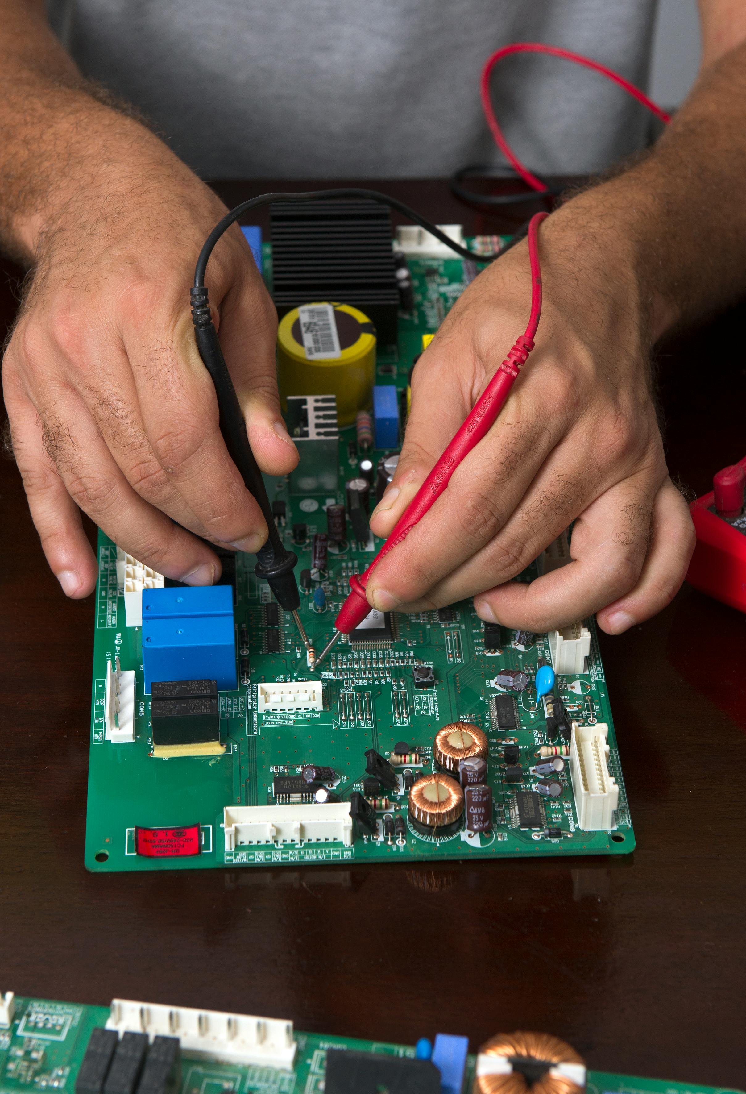 Homeowner reading appliance care tips
